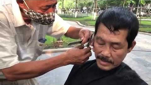 CẮT TÓC VỈA HÈ - MỘT NÉT VĂN HÓA CỦA NGƯỜI HÀ NỘI