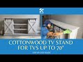 Twin star home cottonwood tv stand tvs up to 70 sliding barn door assembly  lorraine media console