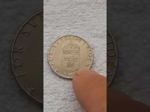 31. The following is a video of a beautiful 1 Krone coin of 1989 Carl XVI Gustaf Swedish