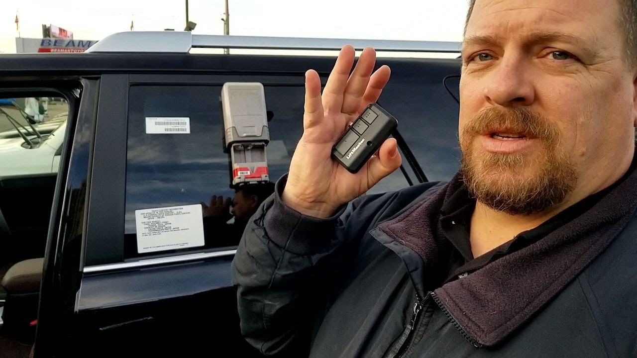 Setting your garage door remote to your vehicle - YouTube