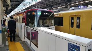 168.京急川崎駅を発車する京急2100形と京急1000形京急イエローハッピートレイン