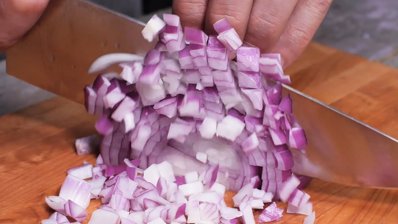 Zen of Sharpness : The Thomas Keller Signature Collection Gliding Through an Onion