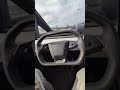 Tesla FSD finds a charger and parks itself. In the future Optimus will plug it in