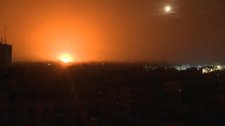 Gaza City night sky filled with explosions and flares | AFP