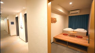 Staying in a modern, lockable, simple hotel in Kyoto. Woman travelling alone