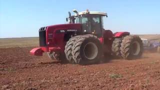 Versatile 575 Tractor pulling a 64 foot chisel plow - Munday Texas