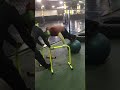 Stroke survivor high hurdle pushups with feet on stability ball