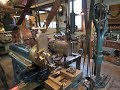 OLD STEAM POWERED MACHINE SHOP  34   setting up a cutter grinder