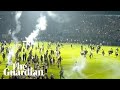 Teargas Fired At Indonesian Football Match Causing Crowd Crush Teargas Fired At Indonesian Football Match Causing Crowd Crush