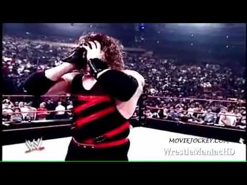 Kane Removes His Mask and show His Burning face