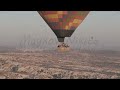 D-Log M. Goreme, Nevsehir, Turkey. Family and friends group in large hot air balloon basket enjoy...