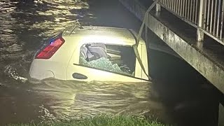 Hero saves child and driver from car submerged in dangerous flood water