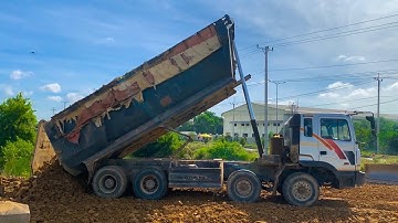 Great Project processing Land fill up Skills Operator Bulldozer working pushing into water.