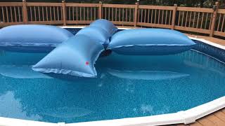 Winterizing an above-ground pool with pool pillows