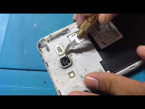 Cambio de cristal de cámara de Samsung j7 neo
