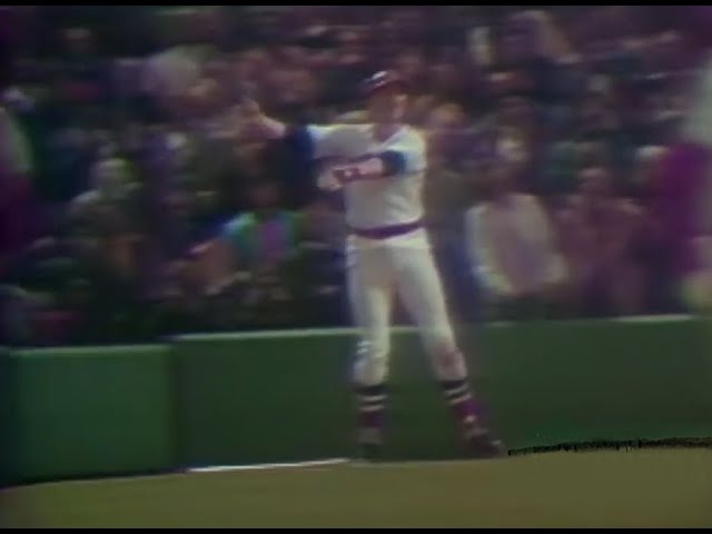 Red Sox catcher Carlton Fisk waving his winning home run fair in