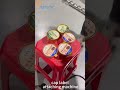 Upper surface labeling machine, cap top labeling machine, cap label attaching machine