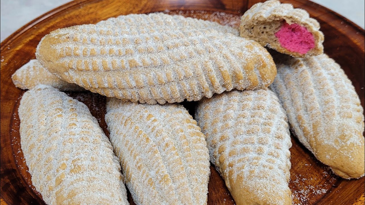 como hacer elotes rellenos de canela espolboriados con azucar