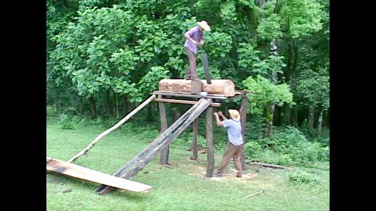 07 RETRATOS DA COLÔNIA madeira Cap II serrar tábuas a mão