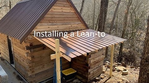 Primitive off grid  log cabin Adding a Lean-to