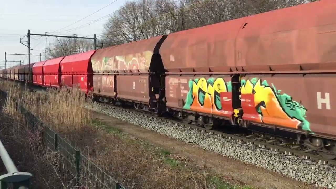 Coal Train with 3 Brandnew Red DB Cargo Coal Railcars ( Wagons) at Blerick The Netherlands 16.2.2023