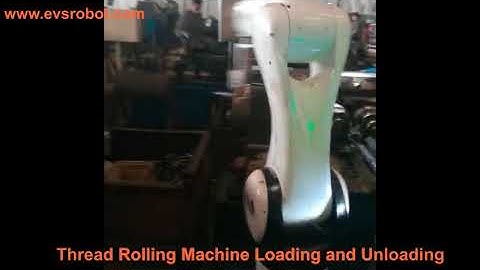 Thread rolling machine loading and unloading 2