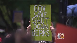 Protesters Demand Change At 'Families Belong Together' Rally In Logan Square