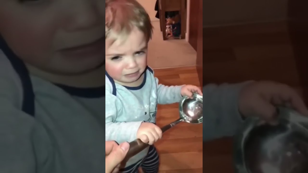 THIS CRYING TODDLER TAKES A SPOON SO HE CAN HIT HIS BROTHER 