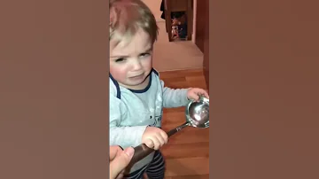 THIS CRYING TODDLER TAKES A SPOON SO HE CAN HIT HIS BROTHER 
