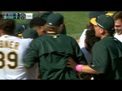 A's walk off on Davis' double, error in 9th