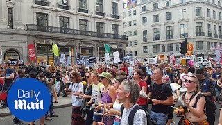 Thousands of anti-Trump protesters rally on Regent Street