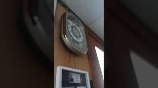 Melodies in motion clock strikes 5:00 PM