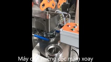 Máy chiết rót và dán miệng cốc mâm xoay xuân phúc 0935109266
