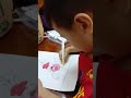 I'm watching my Nephew Siro paint by video call. I'm in Florida and he's in Vietnam.