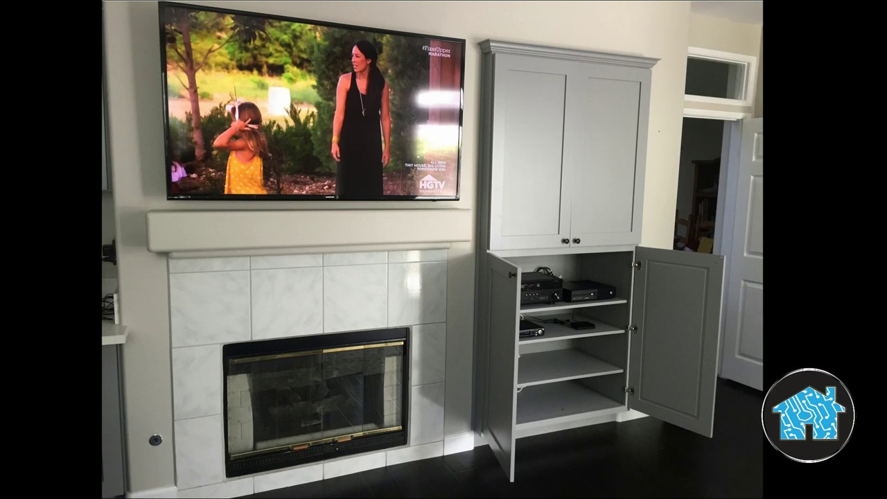 family room surround sound with tv over fireplace youtube
