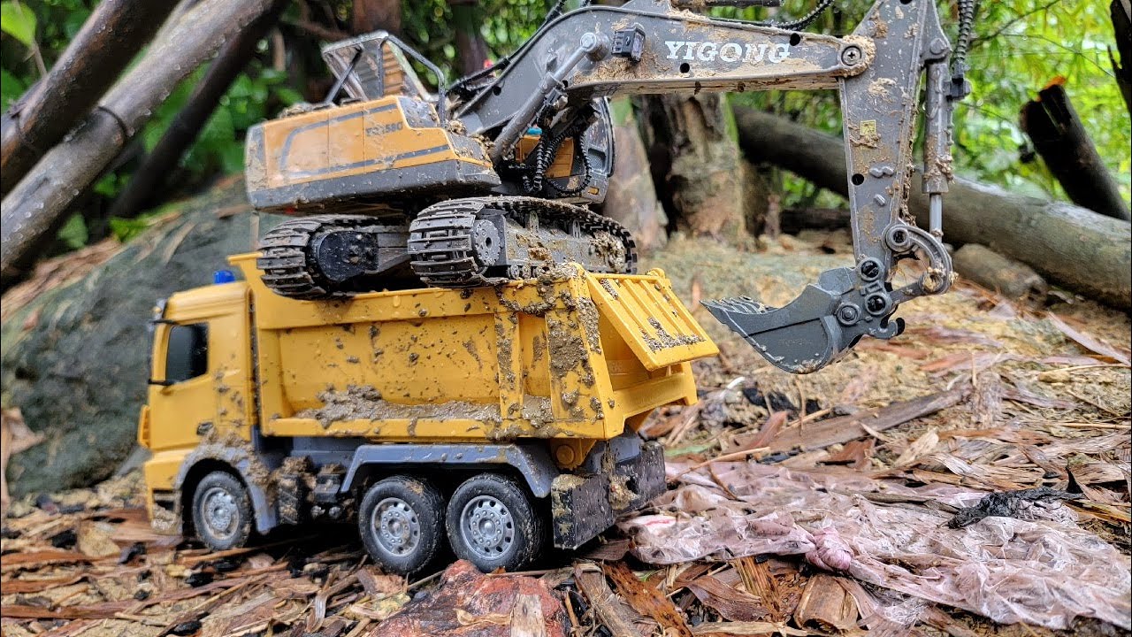 Trucks and excavators carry sand away from the water  #truckdriver  #excavator