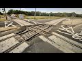 Rare street running railroad diamond with phosphate train amtrak train in lakeland both sides  csx