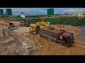 Activities of Bulldozer Dump Trucks Motor Grader to build roads in the construction site