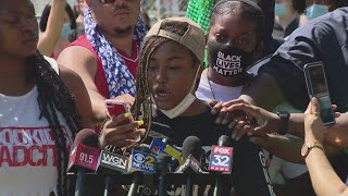 Activist who says she was struck in the face by officer calls for reform, defends social media posts