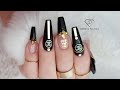 Designer nails. Sculpted fiber gel black & gold nails.Chanel designer logo nails. Coco chanel