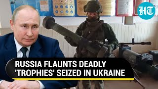 Putin's troops brandish deadly U.S weapons seized from Ukraine's Donetsk | Watch