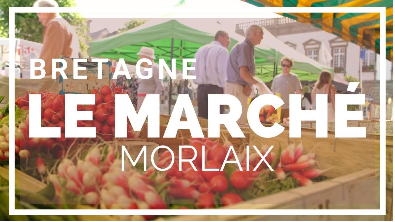 Fruit Stall With People Buying At Morlaix Weekly Market France