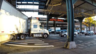 Truck making a tight turn from Queens Boulevard in Long Island City, Queens, NYC