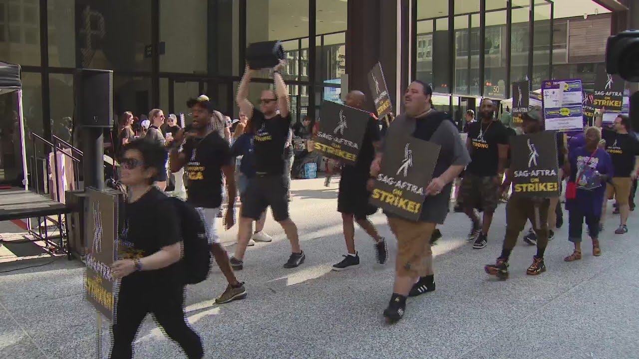 Union members strike at Daley Plaza for actors and writers