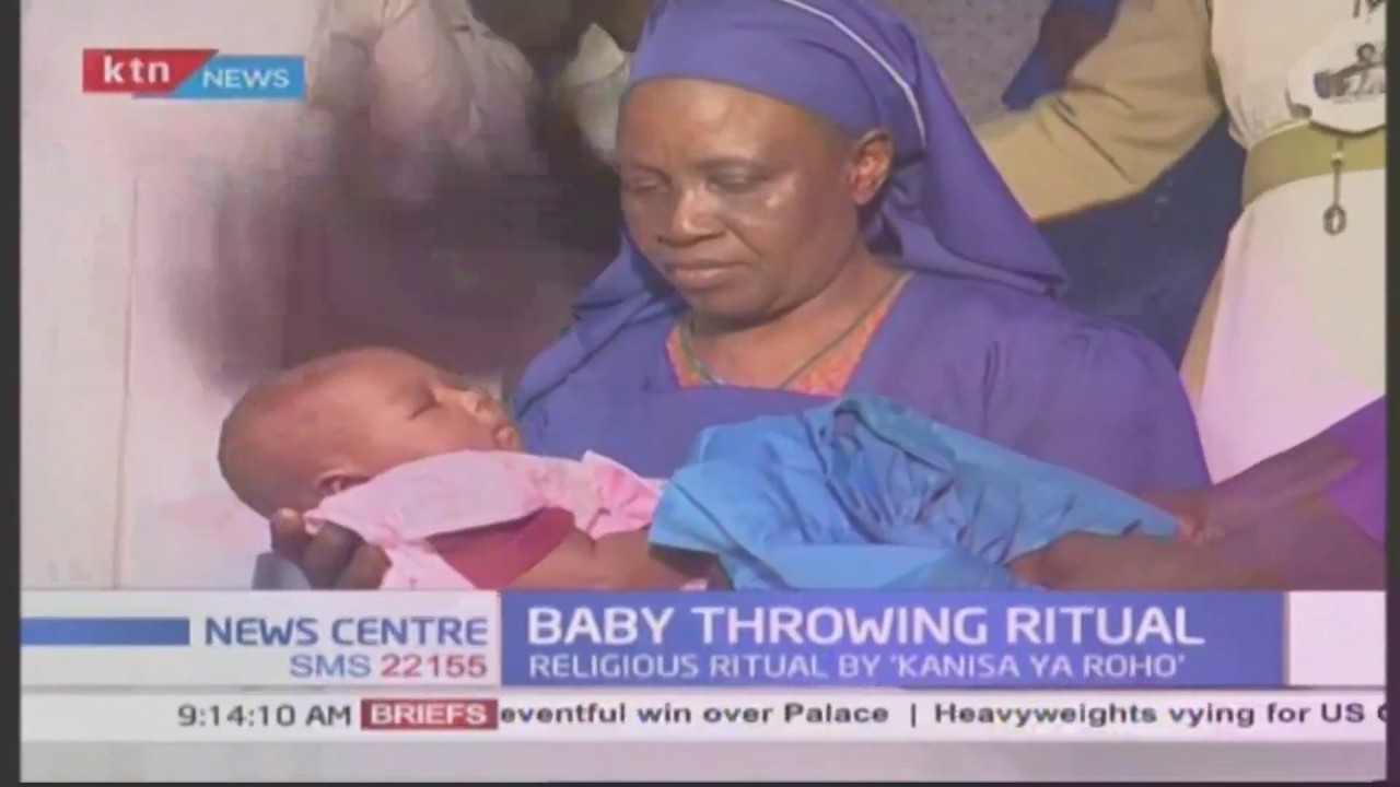 Baby throwing ceremony done by the 'Kanisa la Roho' church YouTube