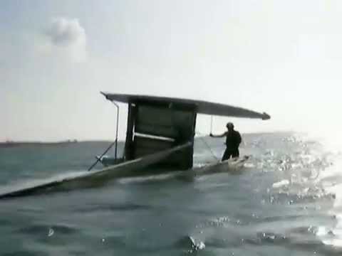 righting a capsized catamaran