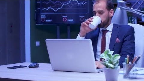 Tired Businessman Drinks Coffee Stock Video
