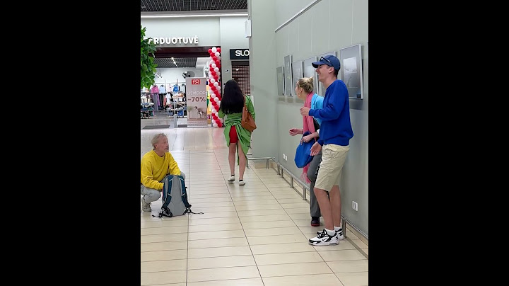 Helping a lady at the mall