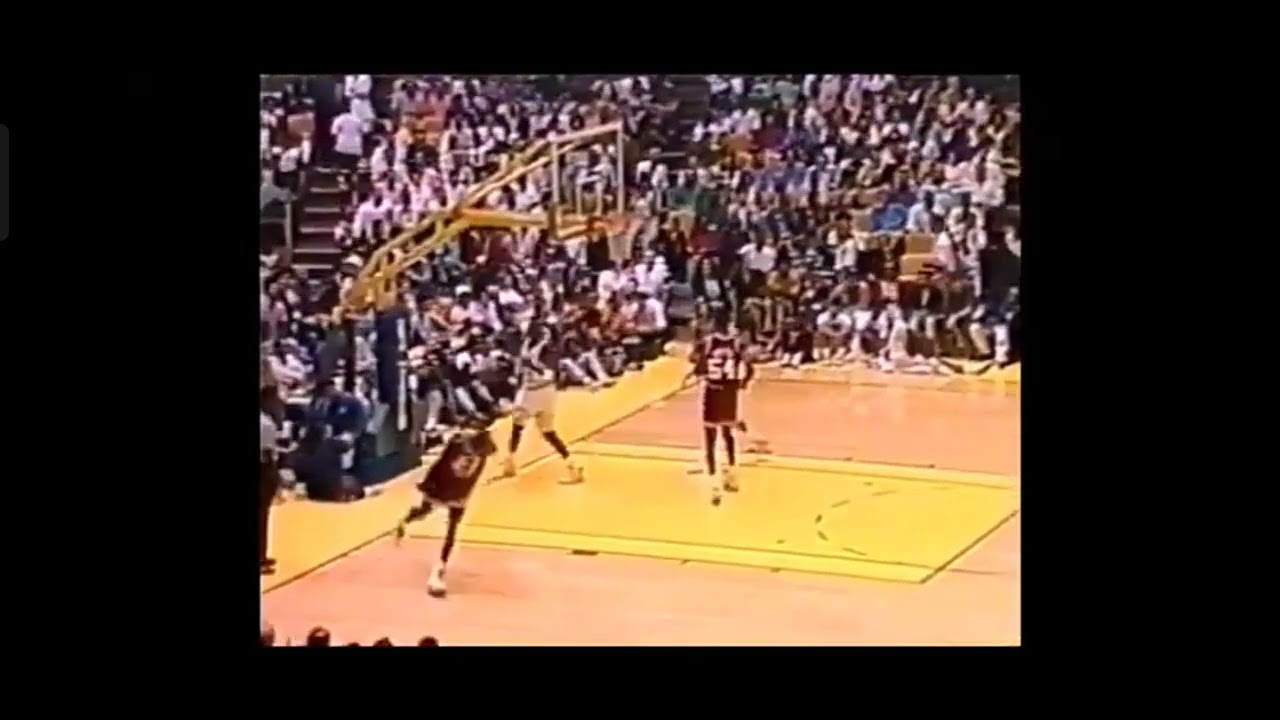 michael jordan dunks on manute bol