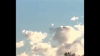 Brilliant UFO Flashes Through Clouds [SIGHTINGS]